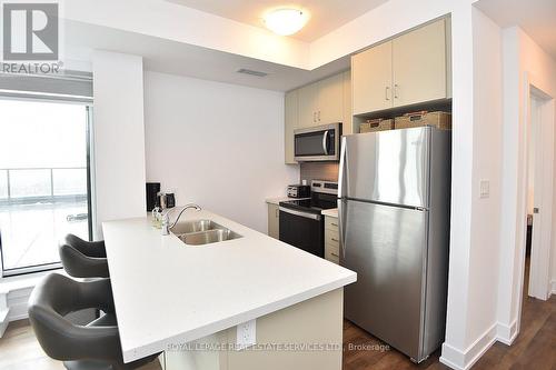909 - 460 Dundas Street E, Hamilton, ON - Indoor Photo Showing Kitchen With Stainless Steel Kitchen With Double Sink