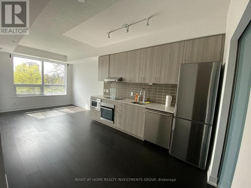 211 - 7 Kenaston Gardens, Toronto, ON - Indoor Photo Showing Kitchen With Stainless Steel Kitchen