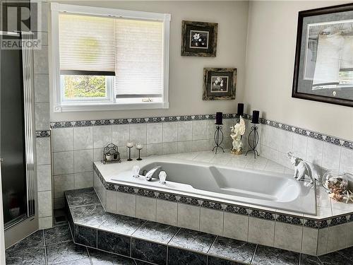 Separate soaking tub - 2525 Fawcett Road, Winchester, ON - Indoor Photo Showing Bathroom