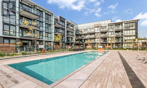 #307 -375 Sea Ray Ave, Innisfil, ON - Outdoor With In Ground Pool With Facade