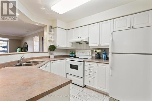 #302 -18 Sommerset Way, Toronto, ON - Indoor Photo Showing Kitchen With Double Sink