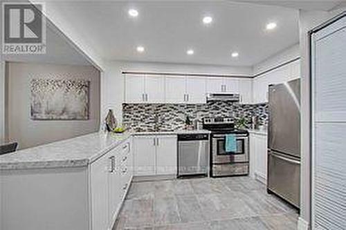 #710 -8 Silverbell Grve, Toronto, ON - Indoor Photo Showing Kitchen With Upgraded Kitchen
