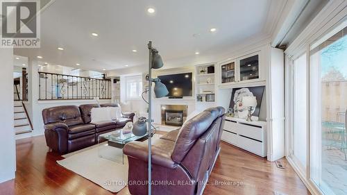 167 Kirk Dr, Markham, ON - Indoor Photo Showing Living Room With Fireplace