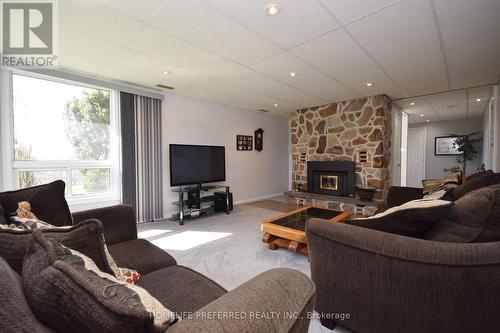 1640 County Road 21, Cavan Monaghan, ON - Indoor Photo Showing Living Room With Fireplace