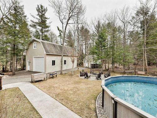 Backyard - 192  - 192A Rue Jacques, Saint-Colomban, QC - Outdoor With Above Ground Pool