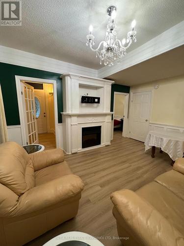 552 Adelaide Street N, London, ON - Indoor Photo Showing Living Room With Fireplace