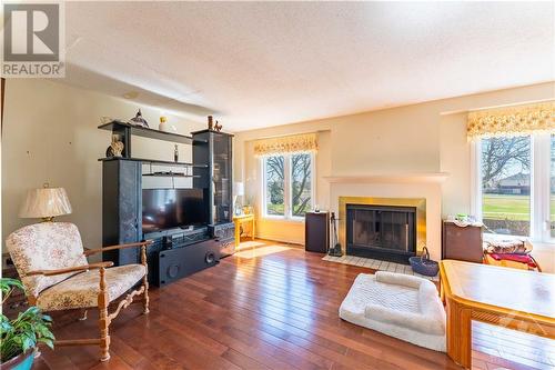 2045 Boake Street, Orleans, ON - Indoor Photo Showing Living Room With Fireplace
