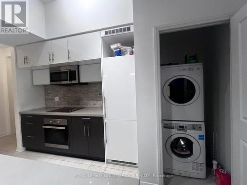 207 - 8 Mercer Street, Toronto, ON - Indoor Photo Showing Laundry Room