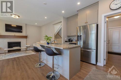 804 Sendero Way, Stittsville, ON - Indoor Photo Showing Kitchen With Fireplace With Upgraded Kitchen
