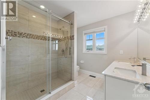 Beautiful spa-like ensuite with large ceramic/glass shower and handheld shower spray. - 109 Hawkeswood Drive, Ottawa, ON - Indoor Photo Showing Bathroom