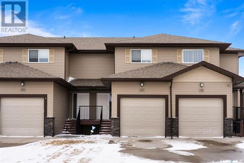 127 Plains Circle, Pilot Butte, SK - Outdoor With Facade