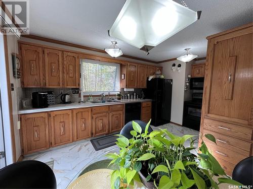 227 Lockwood Road, Regina, SK - Indoor Photo Showing Kitchen With Double Sink