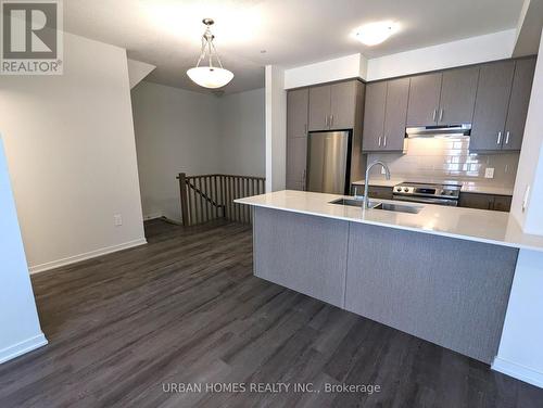 #65 -31 Honeycrisp Cres, Vaughan, ON - Indoor Photo Showing Kitchen With Stainless Steel Kitchen With Upgraded Kitchen