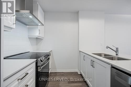 #136 -40 William Jackson Way, Toronto, ON - Indoor Photo Showing Kitchen With Double Sink