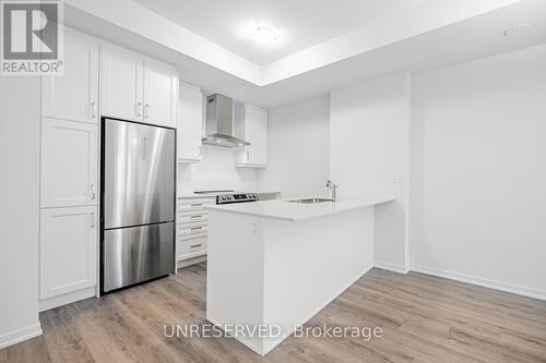#136 -40 William Jackson Way, Toronto, ON - Indoor Photo Showing Kitchen With Upgraded Kitchen