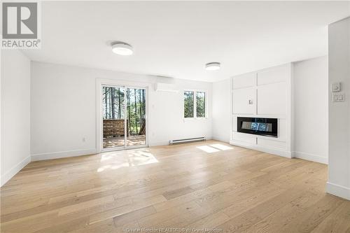 167 Elsliger St, Dieppe, NB - Indoor Photo Showing Living Room With Fireplace