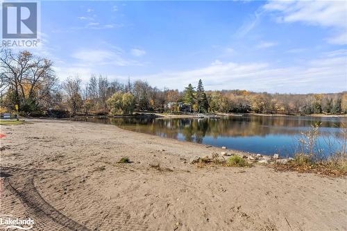 Public beach and boat launch onto Eagle Lake view 3 - 1257 Sir Sams Road, Haliburton, ON - Outdoor With Body Of Water With View