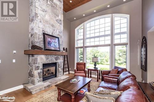 3876 Muskoka 118 Road W Unit# Sandfield 1 Week 3, Port Carling, ON - Indoor Photo Showing Living Room With Fireplace