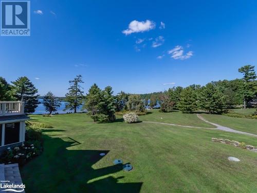 Landscaped gardens - 3876 Muskoka 118 Road W Unit# Sandfield 1 Week 3, Port Carling, ON - Outdoor With View