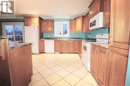 146 Veterans Drive, Cormack, NL - Indoor Photo Showing Kitchen With Double Sink