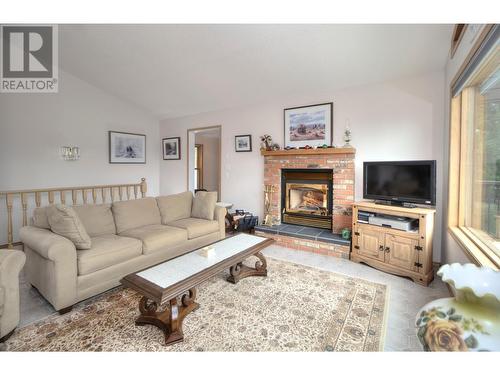 2360/2380 95 Highway, Spillimacheen, BC - Indoor Photo Showing Living Room With Fireplace