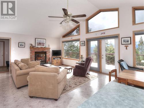 2360/2380 95 Highway, Spillimacheen, BC - Indoor Photo Showing Living Room With Fireplace