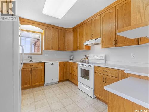 301 910 Heritage View, Saskatoon, SK - Indoor Photo Showing Kitchen With Double Sink