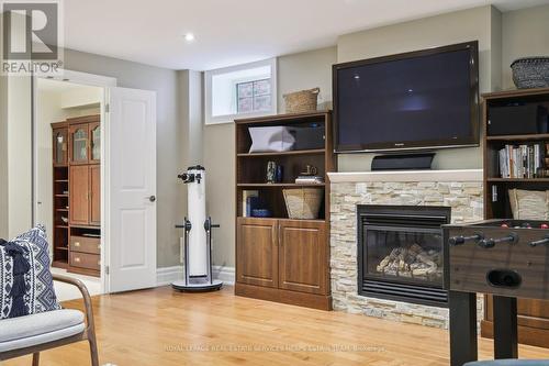 25 Southvale Dr, Toronto, ON - Indoor Photo Showing Living Room With Fireplace