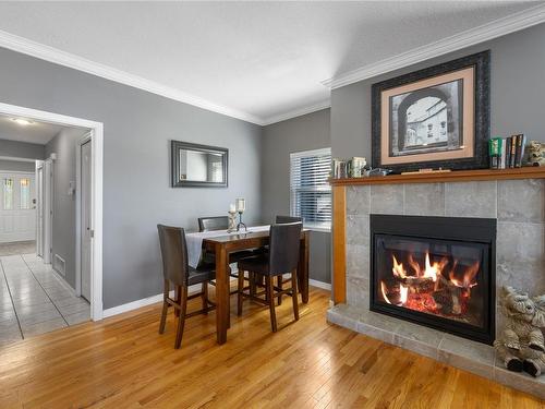 180 Crome Point Rd, Bowser, BC - Indoor Photo Showing Living Room With Fireplace