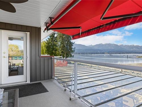 180 Crome Point Rd, Bowser, BC - Outdoor With Body Of Water With Exterior