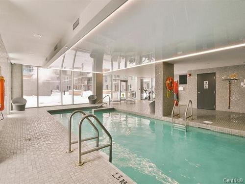 Piscine - 142-5100 Rue Molson, Montréal (Rosemont/La Petite-Patrie), QC - Indoor Photo Showing Other Room With In Ground Pool