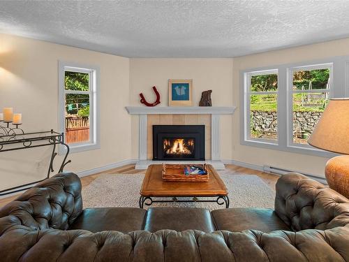 1573 Mayneview Terr, North Saanich, BC - Indoor Photo Showing Living Room With Fireplace
