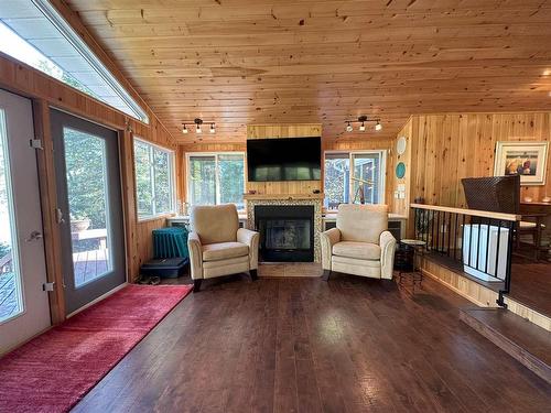 Fr 4 Lot 7 Woodchuck Bay, Kenora, ON - Indoor Photo Showing Living Room With Fireplace
