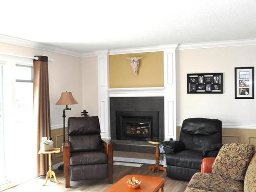 17 Emerald Drive, Logan Lake, BC - Indoor Photo Showing Living Room With Fireplace