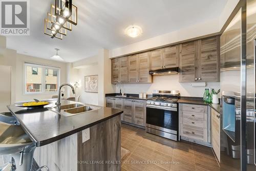 25 - 8317 Mulberry Drive, Niagara Falls, ON - Indoor Photo Showing Kitchen With Double Sink With Upgraded Kitchen