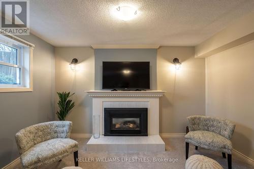 1 Mcgill Place, London, ON - Indoor Photo Showing Living Room With Fireplace