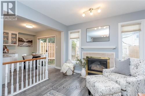 #10 -10 Rossmore Crt, London, ON - Indoor Photo Showing Living Room With Fireplace