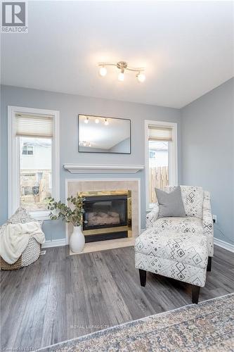 10 - 10 Rossmore Court, London, ON - Indoor Photo Showing Living Room With Fireplace