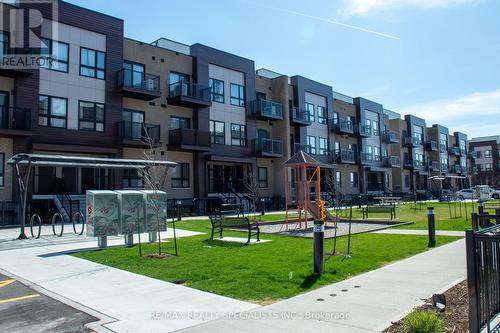 #E7 -20 Palace St, Kitchener, ON - Outdoor With Balcony With Facade