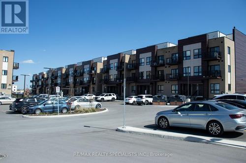 #E7 -20 Palace St, Kitchener, ON - Outdoor With Balcony With Facade
