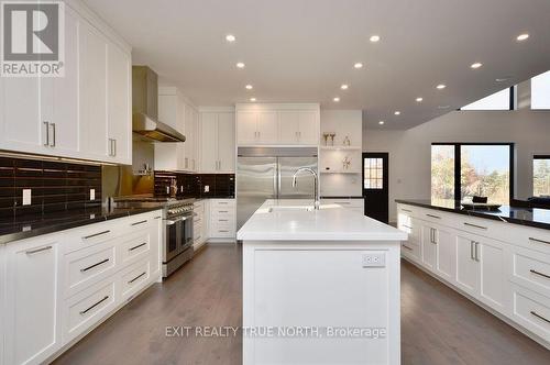 57 Glenhuron Drive, Springwater, ON - Indoor Photo Showing Kitchen With Upgraded Kitchen
