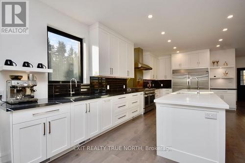 57 Glenhuron Drive, Springwater, ON - Indoor Photo Showing Kitchen With Double Sink