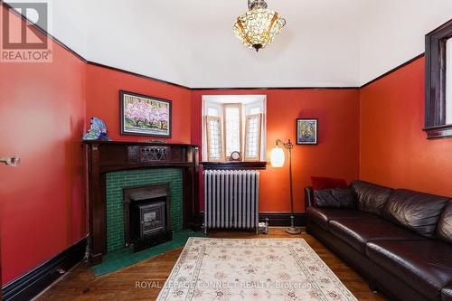 149 Springhurst Ave, Toronto, ON - Indoor Photo Showing Living Room With Fireplace