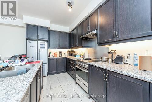 24 Tarmola Park Crt, Toronto, ON - Indoor Photo Showing Kitchen With Double Sink With Upgraded Kitchen