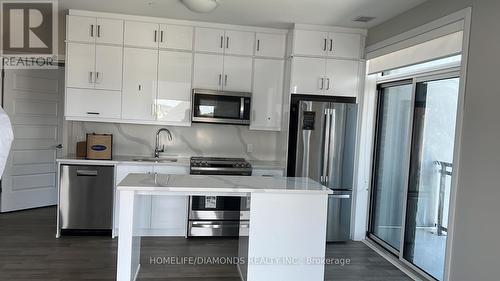 305 - 50 Kaitting Trail, Oakville, ON - Indoor Photo Showing Kitchen With Upgraded Kitchen