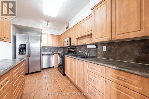 #1209 -2055 Upper Middle Rd, Burlington, ON - Indoor Photo Showing Kitchen With Double Sink