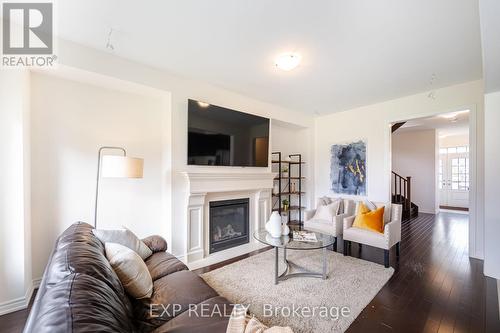 1322 Apollo St N, Oshawa, ON - Indoor Photo Showing Living Room With Fireplace