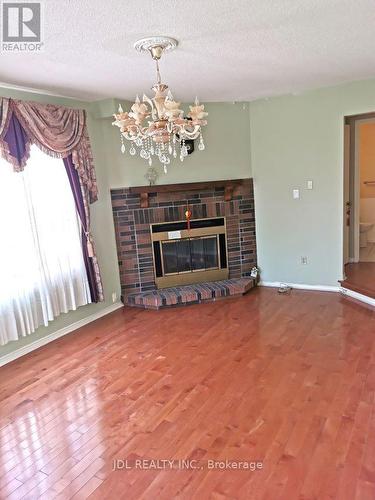 12 Coledale Rd, Markham, ON - Indoor Photo Showing Living Room With Fireplace