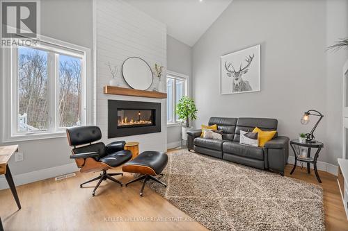 61 Sandy Coast Cres, Wasaga Beach, ON - Indoor Photo Showing Living Room With Fireplace