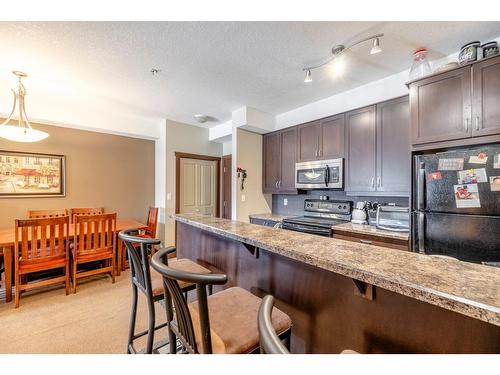 307 - 1500 Mcdonald Avenue, Fernie, BC - Indoor Photo Showing Kitchen With Upgraded Kitchen